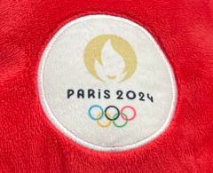 Question écrite sur le livret des Jeux olympiques de Paris 2024 distribué aux écoliers