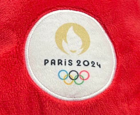 Question écrite sur le livret des Jeux olympiques de Paris 2024 distribué aux écoliers